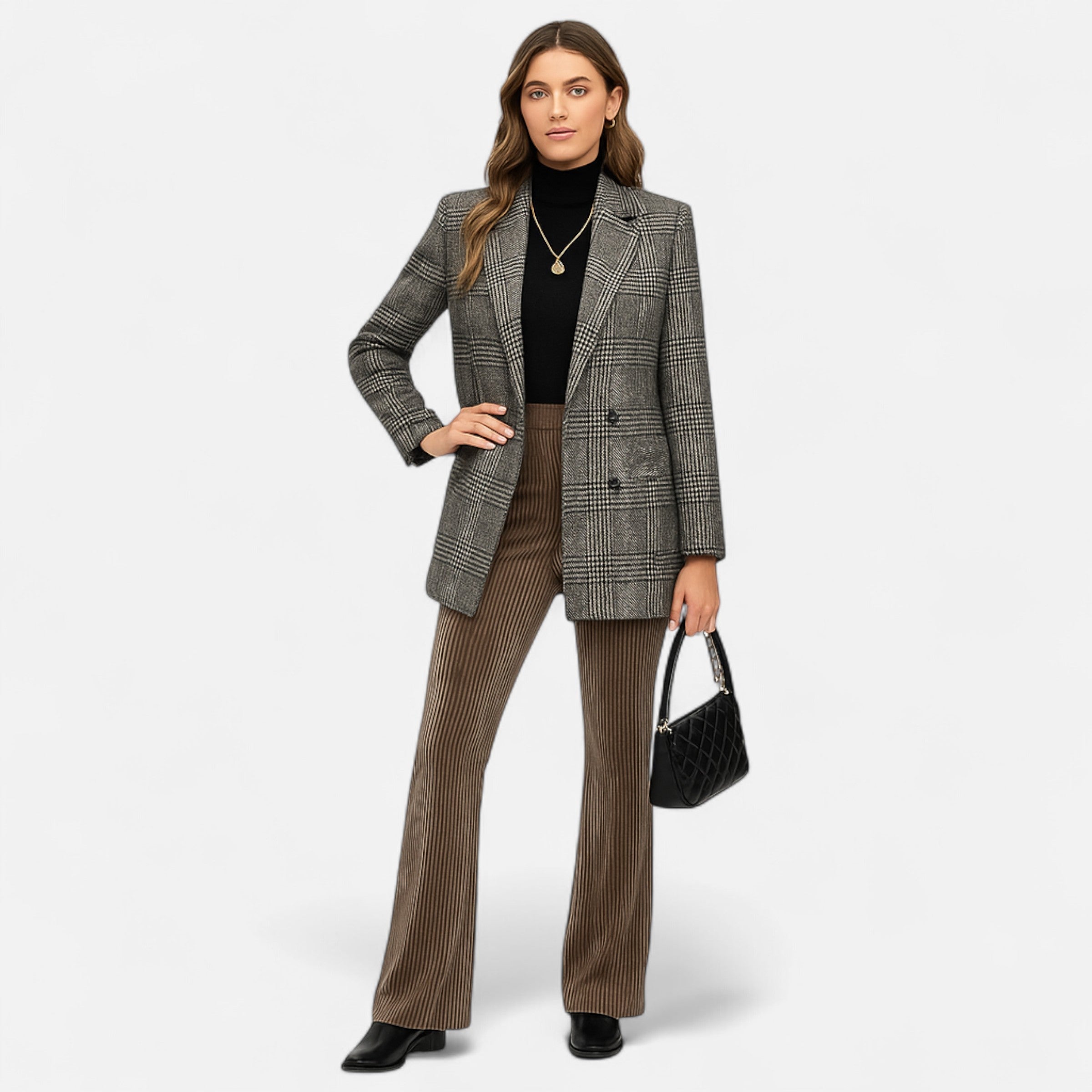 Woman wearing a gray checkered blazer and brown pinstripe pants on a white background