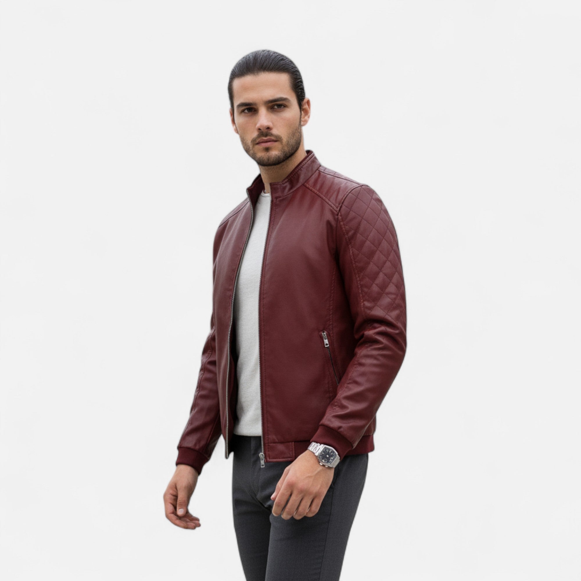 Man wearing a maroon leather jacket on a white background