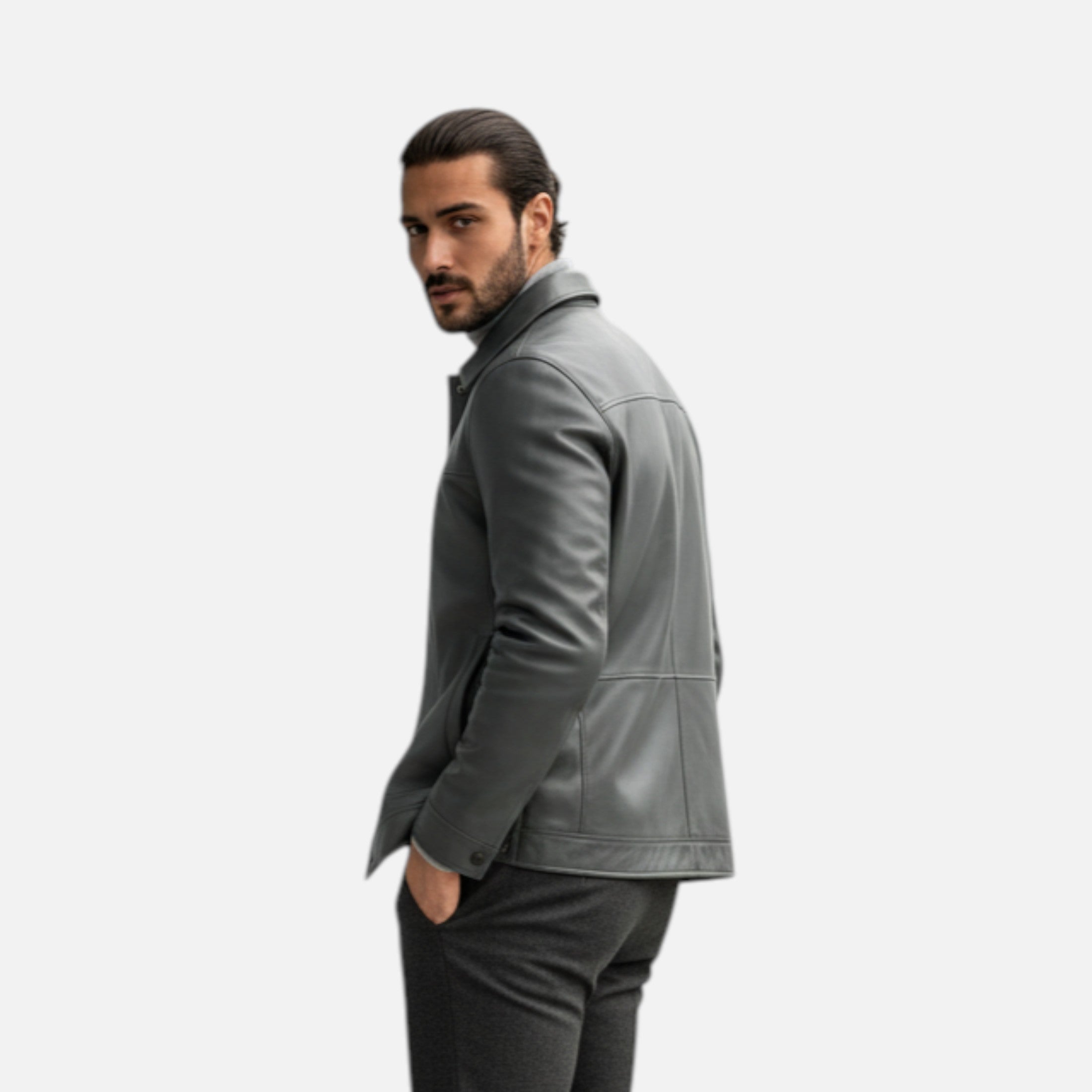 Man wearing a gray leather jacket on a white background