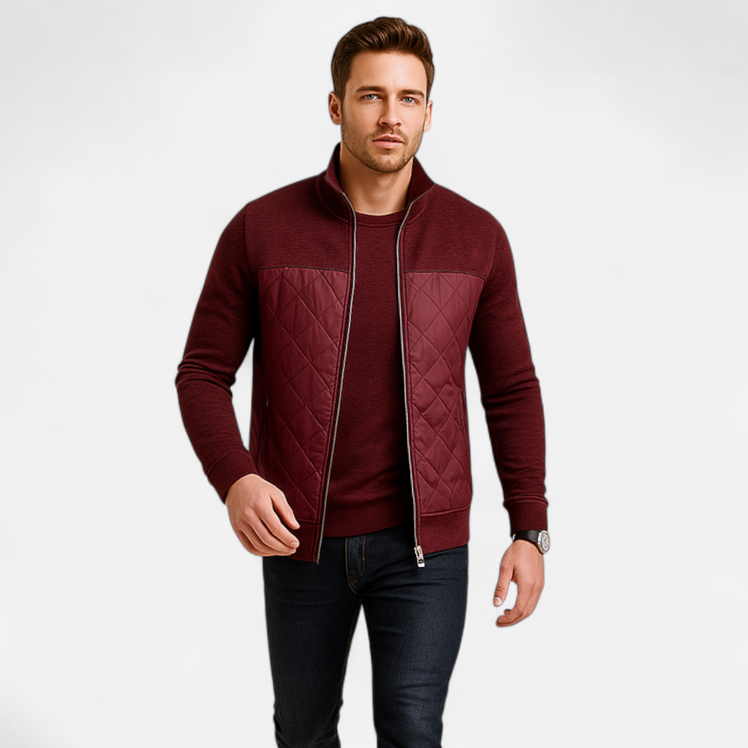 Man wearing a maroon quilted jacket on a white background