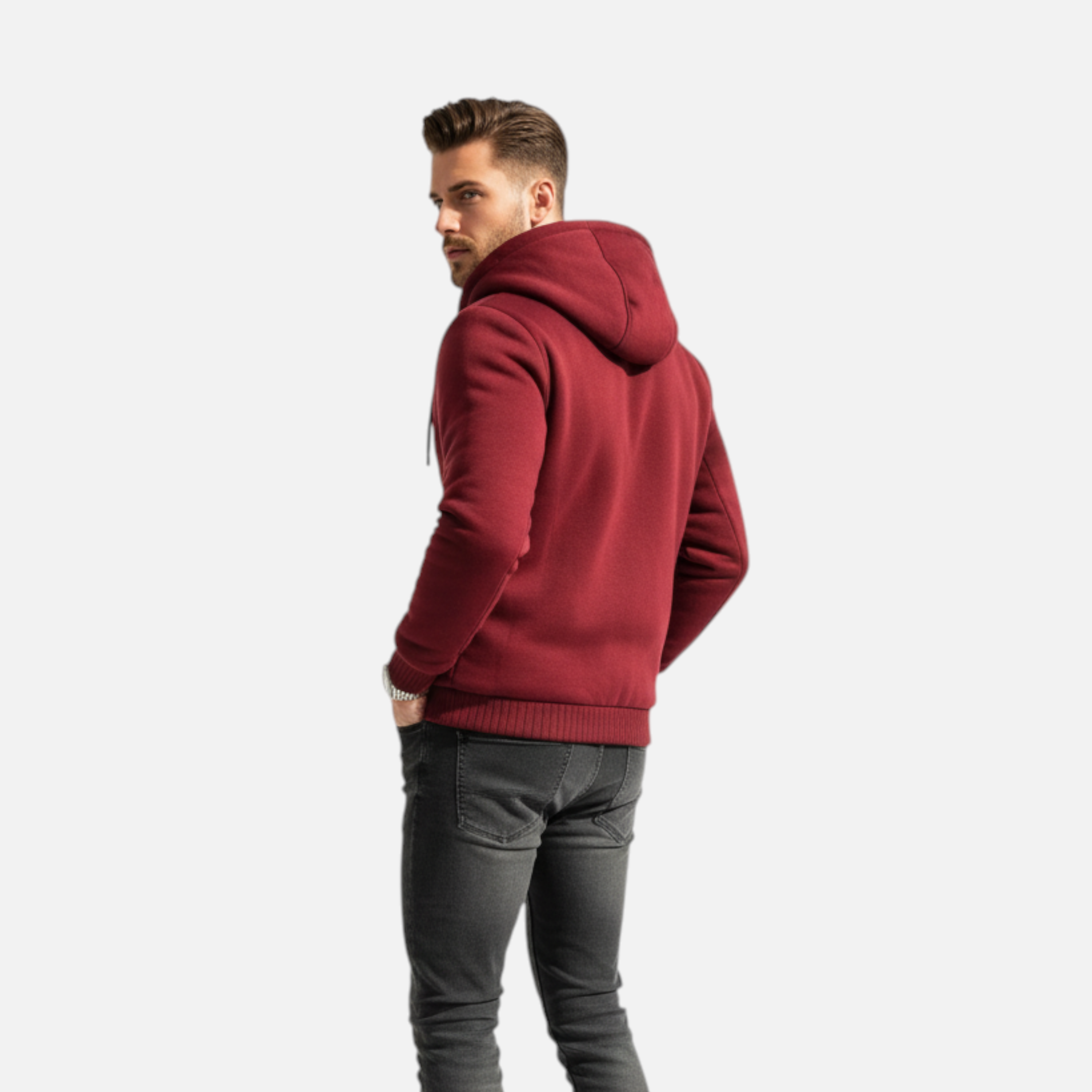 Man wearing a red hoodie and gray pants on a white background