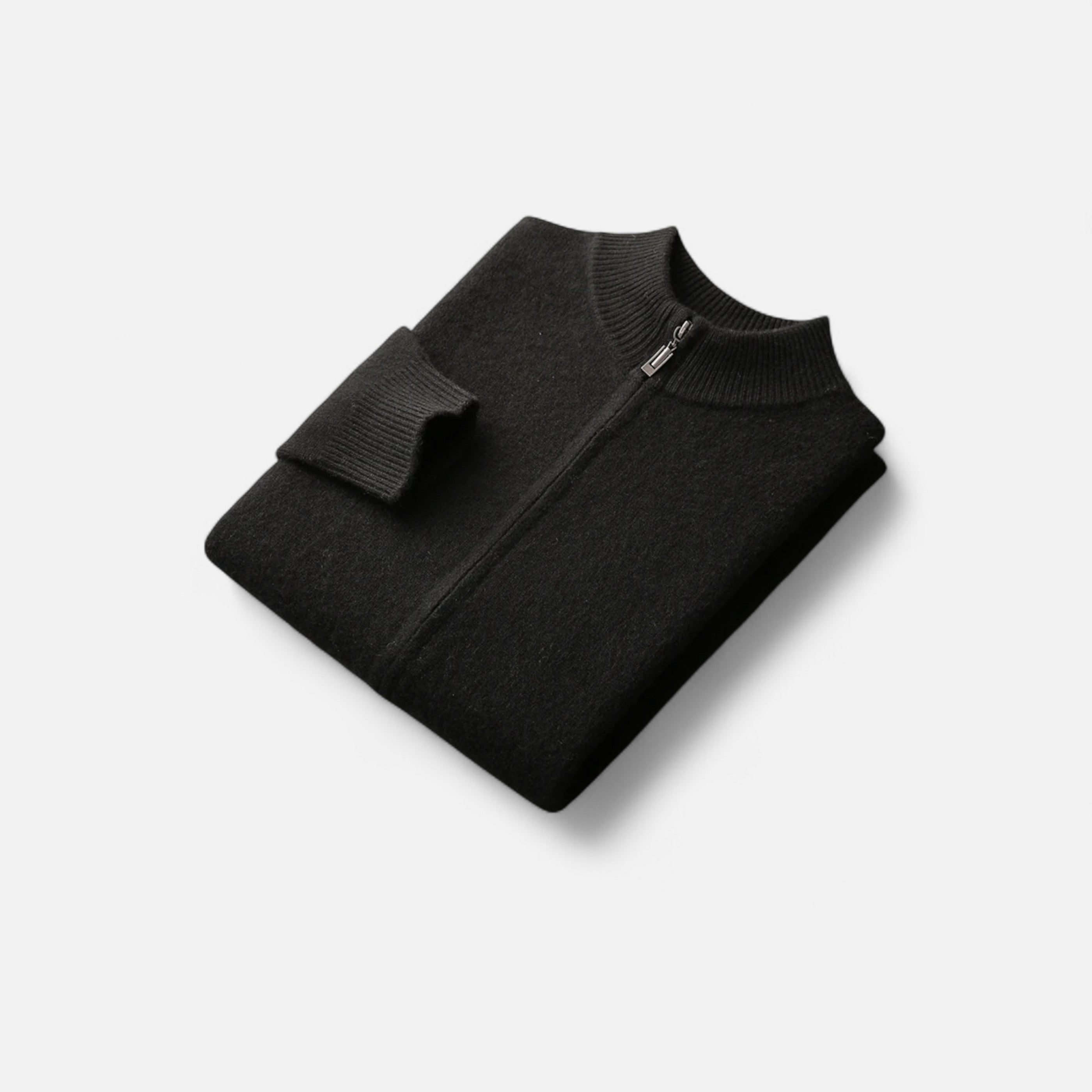 Black sweater with a zipper on a light gray background