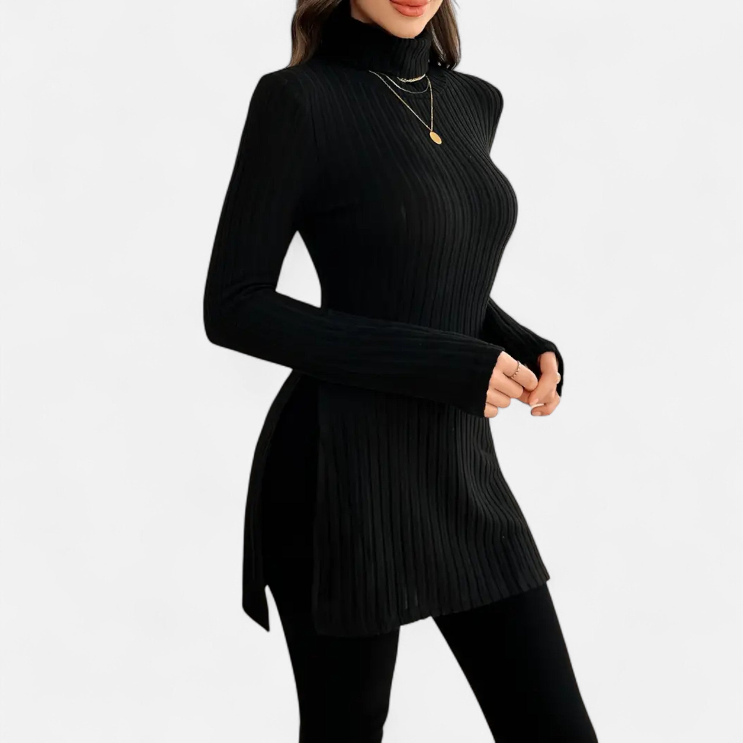 Black ribbed sweater with a pleated skirt on a white background